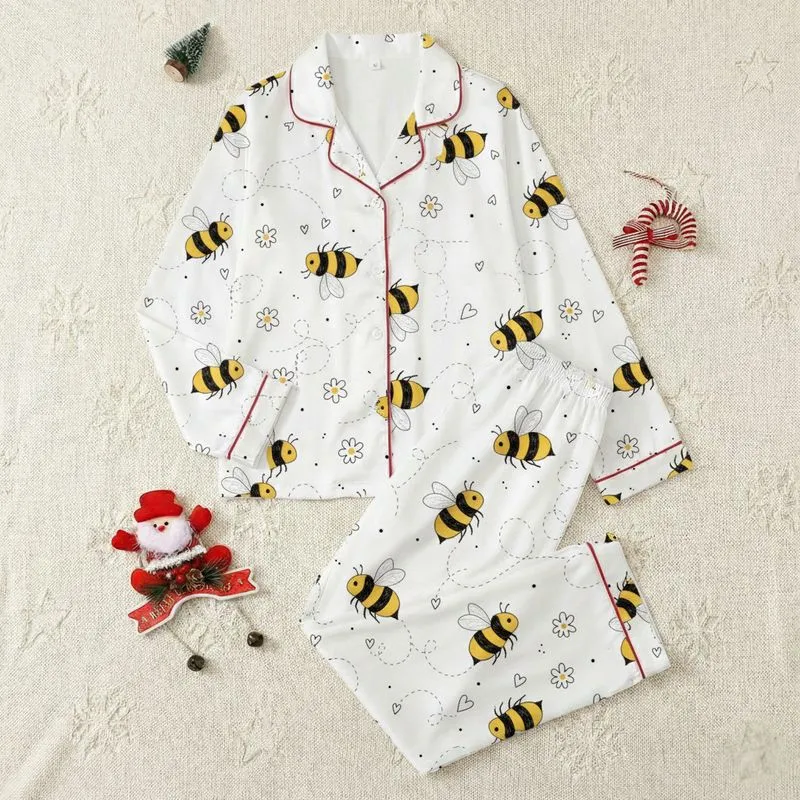 Women's Whimsical Black & Yellow Bumblebee Flight Pattern with Outlined Hearts, Flowers & Dashed Lines on White Satin Pajamas Set - 1