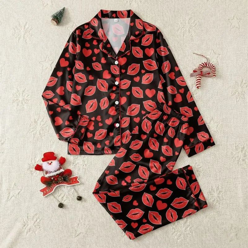 Women's Bold Red Lipstick Kiss Marks & Scattered Hearts Graphic Art on Black Satin Pajamas Set - 1