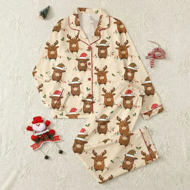 Highland Cow Lovers' Family Holiday Whimsical Highland Cow Christmas Pattern with Santa Hats, Colorful Lights & Holly on Cream Satin Pajamas Set - 1
