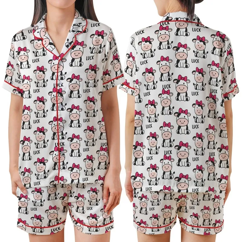 Women's Cute Simplified Cartoon Cow All-Over Pattern Pink Bows Lucky Black Text White Background Satin Short-Sleeve Pajamas Set - 1