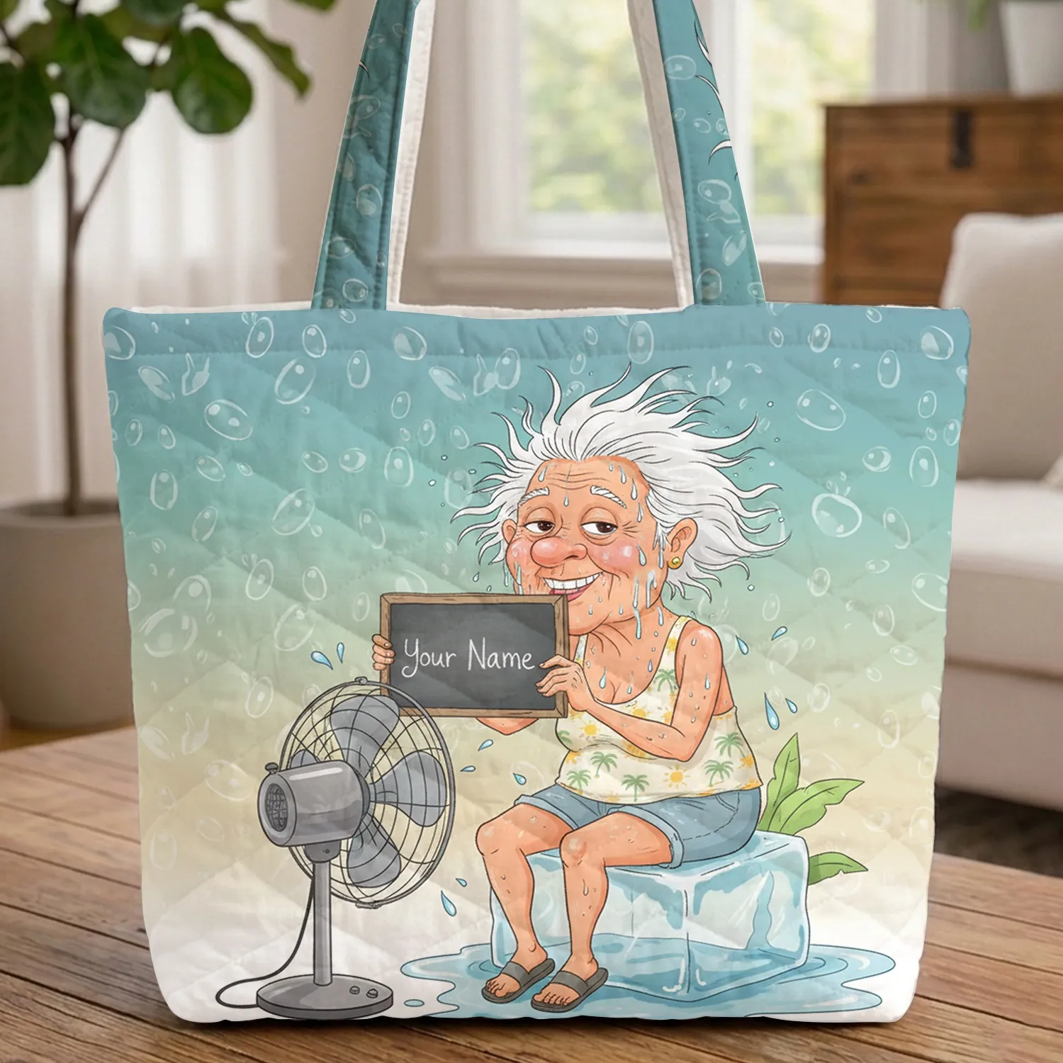 Comical Elderly Woman Sweating on Ice Block with Fan - Summer Heat Relief Gift Quilted Tote Bag - 1