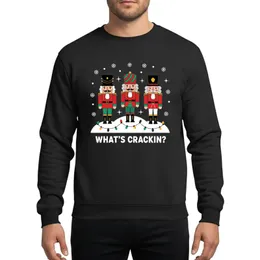 Festive Fun Seekers' Three Traditional Nutcrackers Vibrant Red Green Gold Snowdrift Vintage Lights Playful 'WHAT'S CRACKIN'?' Phrase Sweatshirt