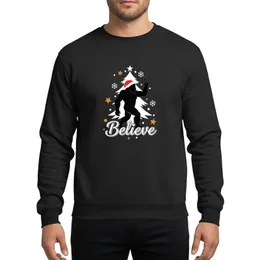 Bigfoot Believers' Stylized Black Bigfoot Rock-On Santa Hat White Christmas Tree Believe Script Gold Star Snowflakes Sweatshirt