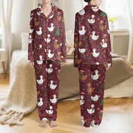 Holiday Lovers' Whimsical Cartoon Christmas Ducks Festive Maroon Pattern with Santa Hats, Reindeer Antlers, and String Lights Satin Pajamas Set