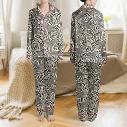 Women's High-Contrast Black Cream Illustrative Zebra Seamless All-Over Print Satin Pajamas Set