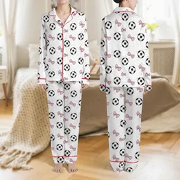 Women's White Base Playful Scattered Soccer Ball Light Pink Bow & Polka Dot Pattern Satin Pajamas Set