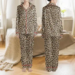 Women's Deep Black Abstract Rounded Shapes Classic Leopard Print Off-White Outline Pattern Satin Pajamas Set