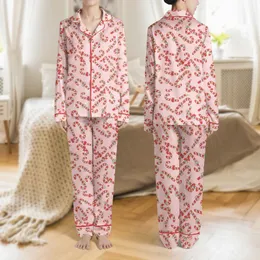 Women's Whimsical Red Mint Candy Cane Repeating Pattern on Soft Baby Pink Satin Pajamas Set
