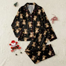 Kids' Deep Black Playful Cartoon Teddy Bears with Golden Orange Hearts Seamless Pattern Satin Pajamas Set