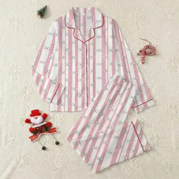 Women's Soft Pastel Pink White Vertical Stripe Repeating Bow Icon Pattern Satin Pajamas Set