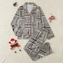 Modern Style Enthusiasts' Dynamic Black White Geometric Grid with Subtle Coral Striped Accents Satin Pajamas Set