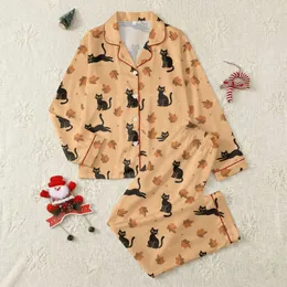 Cat Lovers' Playful Black Cat, Autumn Leaf & Pale Yellow Starburst Seamless Pattern on Peach-Orange Satin Pajamas Set