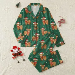 Christmas Celebration Enthusiasts' Whimsical Brown Highland Cow Pattern with Red Santa Hats and Gold Lights on Forest Green Satin Pajamas Set