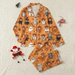 Halloween Family Whimsical Cartoon Cow Halloween Costumes, Candy, & Jack-o'-Lantern Pattern on Vibrant Pumpkin Orange Satin Pajamas Set