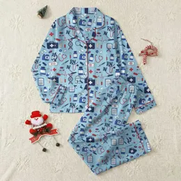 Registered Nurses' Sky Blue Medical Icon Repeating Pattern with Illustrative RN, Stethoscope, & Pills in Red, Dark Blue, White Satin Pajamas Set