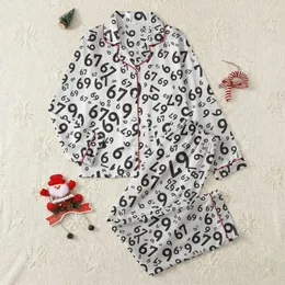 Modern Families' Bold Black & White Minimalist Rounded Numeric Pattern Satin Pajamas Set