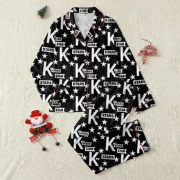 Women's Bold K & STARS Monochrome Print Pajama Ensemble: Black Polyester Round Neck Loungewear Satin Pajamas Set