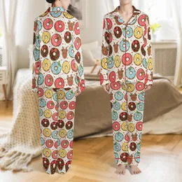 Holiday Enthusiasts' Whimsical Flat Graphic Christmas Donut Pattern: Reindeer, Red, Blue, Yellow Frosted with Sprinkles & Holly Satin Pajamas Set