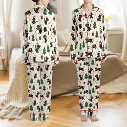 Festive Cat Lovers' Whimsical Black Cat Holiday Pattern with Red Santa Hats, Green Lights & Christmas Trees on Cream Satin Pajamas Set