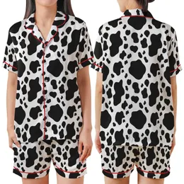 Fashion-Forward Individuals' Bold Black White Organic Irregular Cow Spot Seamless Pattern Satin Short-Sleeve Pajamas Set