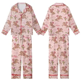 Western Enthusiasts' Whimsical Cowgirl Desert All-Over Print with Pink Hats, Coral Shirts, and Fuchsia Cacti Kid Satin Pajamas Set