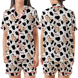 Whimsical Style Lovers' Black White Cow Spot Pattern with Cute Flat Cartoon Cows and Playful Brown "Moo" Text Satin Short-Sleeve Pajamas Set