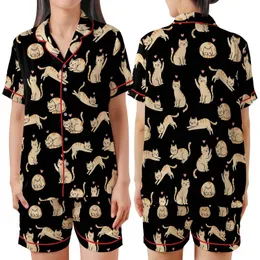 Cat Lovers' Whimsical Black Seamless Pattern with White & Orange-Tan Flat Cartoon Cats & Pink Accents Satin Short-Sleeve Pajamas Set