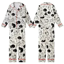 Cat Lovers' Whimsical Hand-Drawn Black and White Feline Pattern with Playful Cats, Yarn, and Fish Kid Satin Pajamas Set
