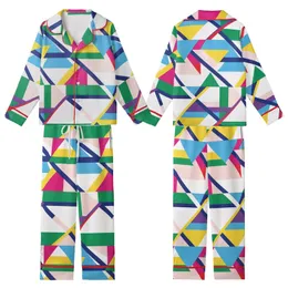 Vibrant Style Enthusiast: Dynamic Geometric Stripe - Multi-Color Patterned Print Kid Satin Pajamas Set