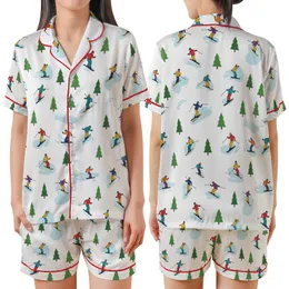 Winter Sports Enthusiast Playful Cartoon Ski & Snowboard Action Scene with Vibrant Yellow Red Blue Figures & Green Trees Satin Short-Sleeve Pajamas Set