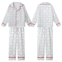 Elegant Geometric Pattern: Interlocking Quatrefoil Muted Blue Swirl Line Art Design Kid Satin Pajamas Set