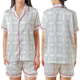 Elegant Geometric Pattern: Interlocking Quatrefoil Muted Blue Swirl Line Art Design Satin Short-Sleeve Pajamas Set