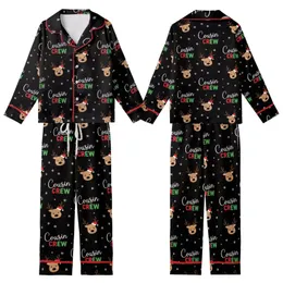 Cousin Crew Festive Graphic: Playful Cartoon Reindeer, Santa Hats & Snowflakes - Black Family Print Kid Satin Pajamas Set