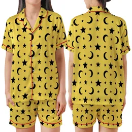 Celestial Enthusiast: Vibrant Lemon Yellow Black Star Moon Seamless Graphic Fashion Accent Satin Short-Sleeve Pajamas Set