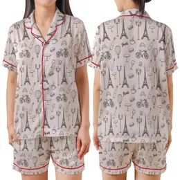 Women's Whimsical Soft Pink Parisian Doodle Seamless Pattern with Eiffel Tower, Macarons & Hot Air Balloons Satin Short-Sleeve Pajamas Set