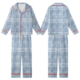 Celestial Dreamer's Stylized Closed Eye & Crescent Moon Design: Muted Dusty Blue Tartan Plaid Kid Satin Pajamas Set