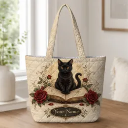 Black Cat on Antique Book with Red Roses for Gothic Literature Lovers and Cozy Readers Quilted Tote Bag