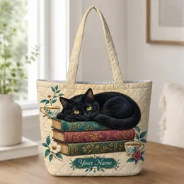 Black Cat Curled on Library Books for Cozy Reading Days and Book Lover Gifts Quilted Tote Bag