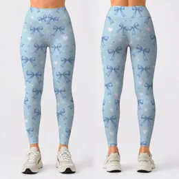 Delicate Sky Blue Bow Accents for Studio Workouts and Everyday Activewear Enthusiasts Leggings