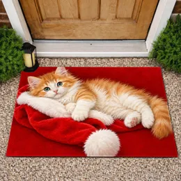 Ginger Kitten Resting on Santa Hat for Cozy Christmas Cheer for Cat Lovers Everywhere Doormat