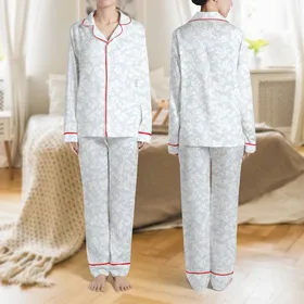 Women's Intricate White Floral Lace Blossom & Filigree Pattern on Ethereal Light Blue-White Satin Pajamas Set
