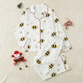 Women's Whimsical Black & Yellow Bumblebee Flight Pattern with Outlined Hearts, Flowers & Dashed Lines on White Satin Pajamas Set