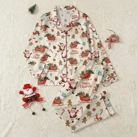 Holiday Enthusiasts' Whimsical Santa Sleigh & Gingerbread Pattern with Red, Green, Blue on Cream Satin Pajamas Set