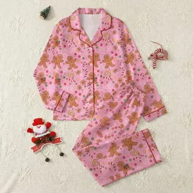 Whimsical Gingerbread Fun: Cheerful Characters, Candy Canes, Pink Gumdrop Swirls - Festive Item Kid Satin Pajamas Set