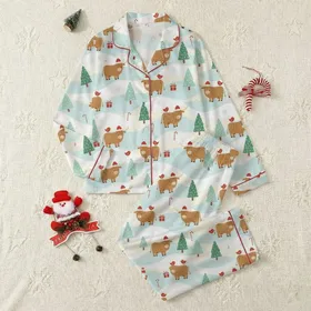 Cozy Holiday Loungewear: Whimsical Highland Cow Winter Wonderland, Snowy Hills & Santa Hats Satin Pajamas Set