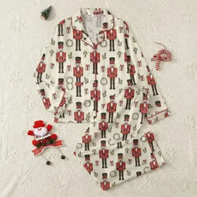 Holiday Enthusiasts' Whimsical Hand-Drawn Nutcracker Toy Soldier Festive Pattern with Cream, Red, Green Winter Foliage Satin Pajamas Set