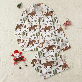 Western Christmas Lovers' Hand-Drawn Cowboy Santa Horse Lasso Cactus Lights Pattern, Terracotta Red Accents Satin Pajamas Set