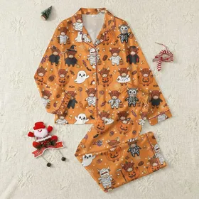 Halloween Family Whimsical Cartoon Cow Halloween Costumes, Candy, & Jack-o'-Lantern Pattern on Vibrant Pumpkin Orange Satin Pajamas Set