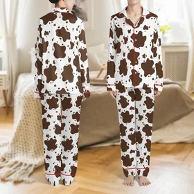 Pattern Lovers' Fluid Organic Dark Brown Cow Print Style on Crisp White Satin Pajamas Set