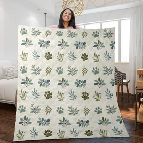 Pet Lovers' Organic Botanical Paw Print and Leaf Motif in Muted Teal, Olive, and Cream Quilt Blanket